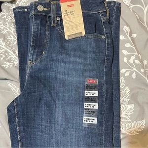 Women’s high rise boot cut jeans size W27xL32
